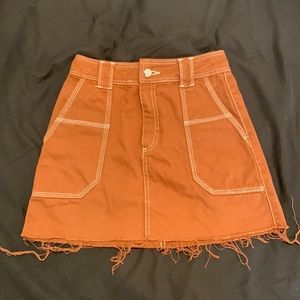 Brown TopShop mini jean skirt, size 2